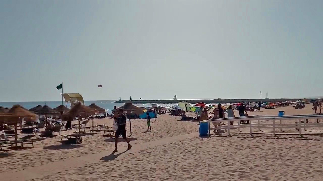 Vilamoura beach looking west towards the marina transit