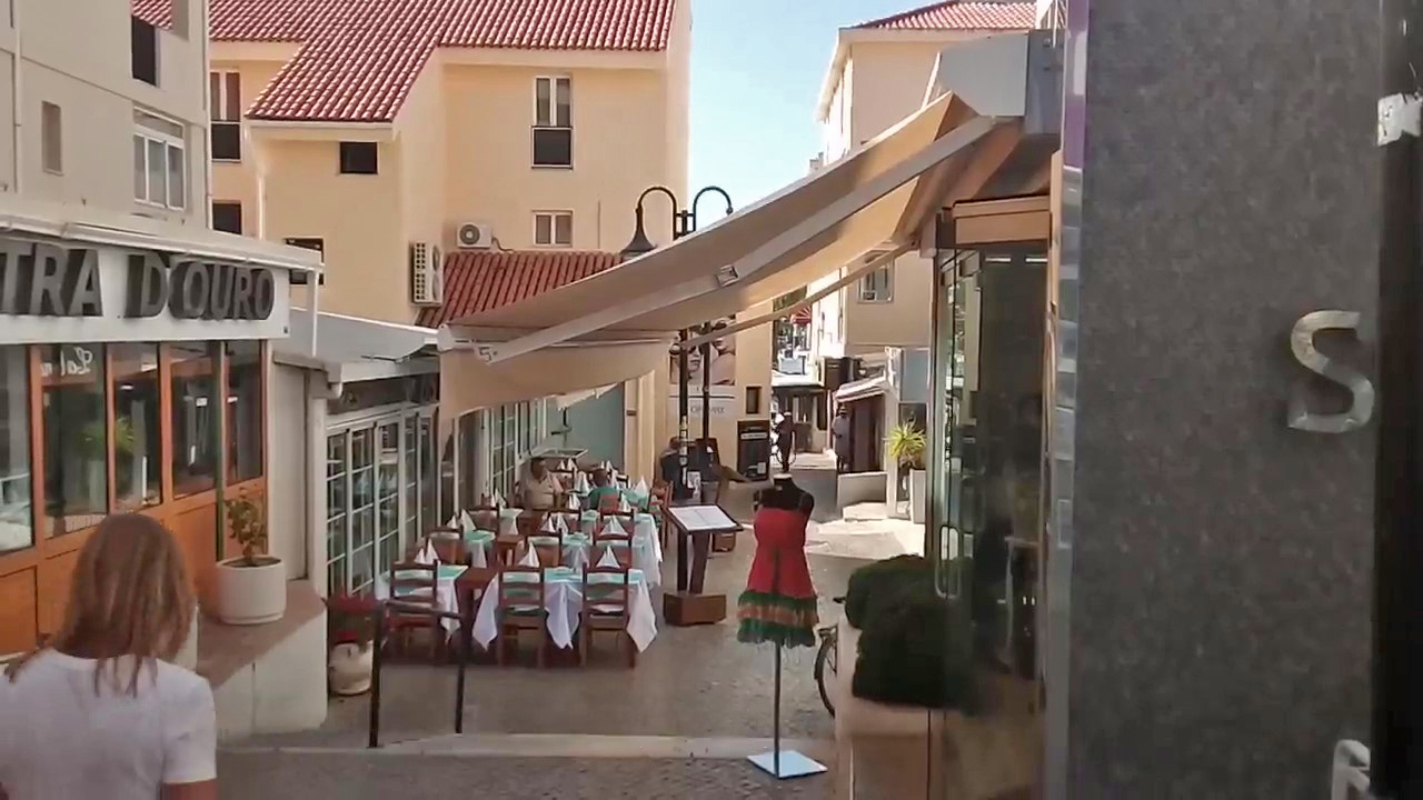 walking in to Vilamoura Marina near the Olympus hotel