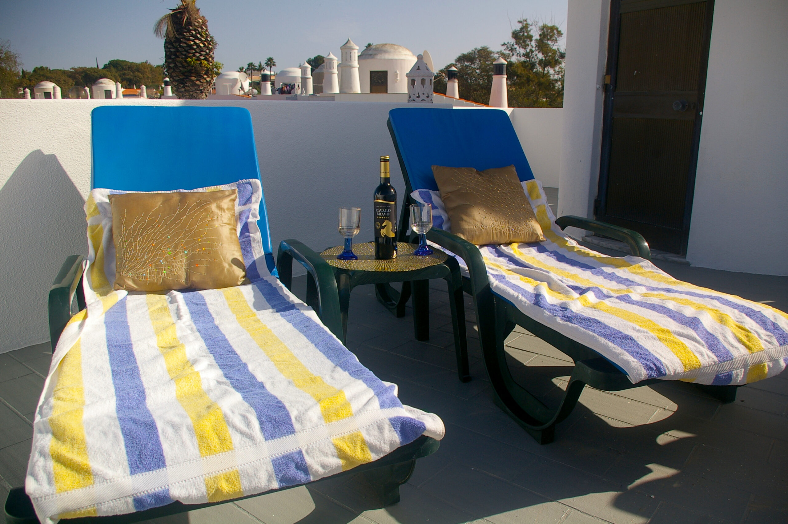Rooftop sun terrace with loungers