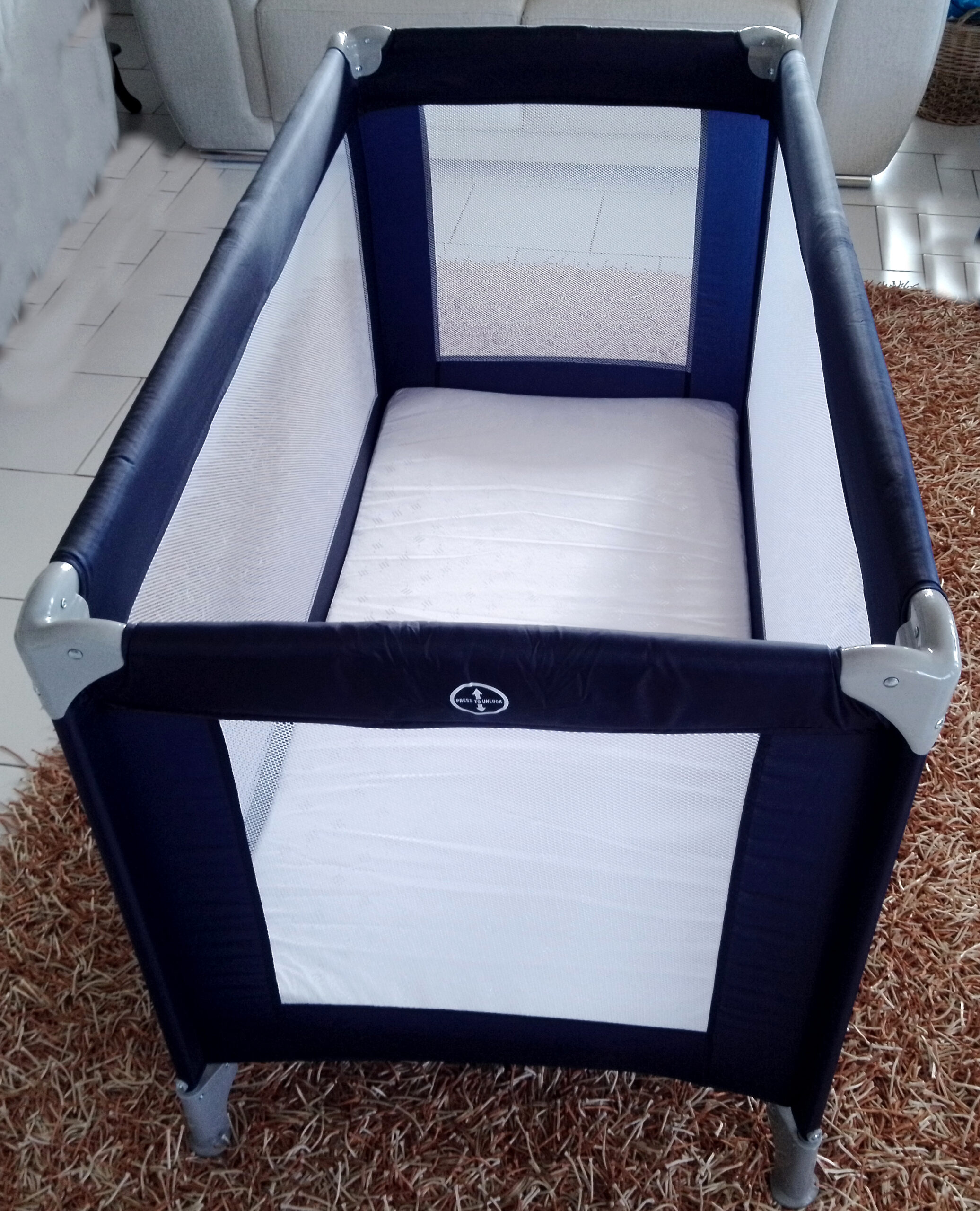 New travel cot for newborn to three year olds
